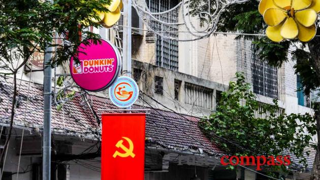 How did Dunkin Donuts and Burger King get prime positions for  Vietnam’s 40th anniversary victory celebrations?